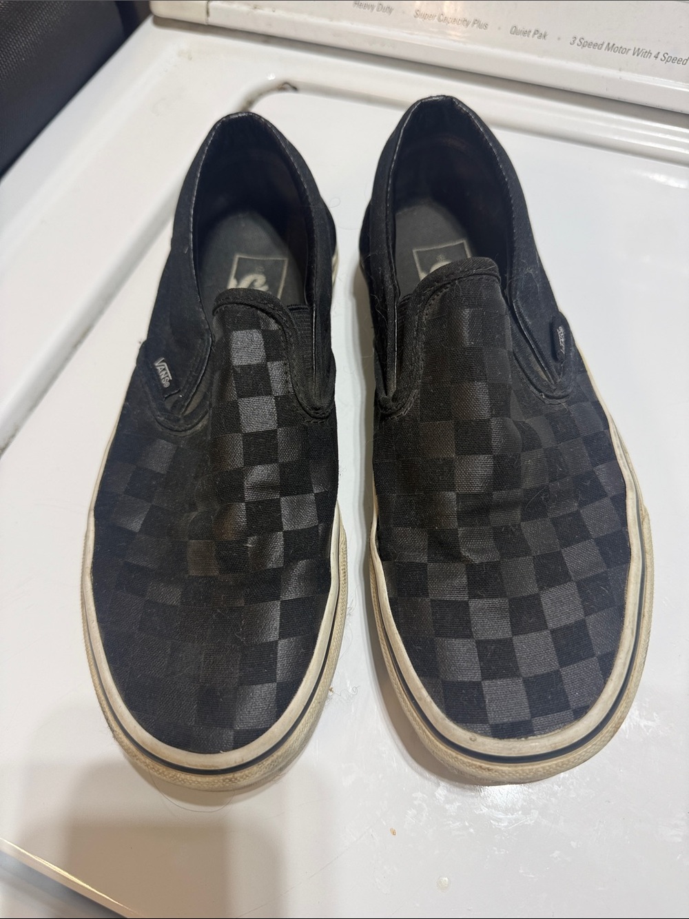 Vans Black Checkerboard Slip-On Sneakers